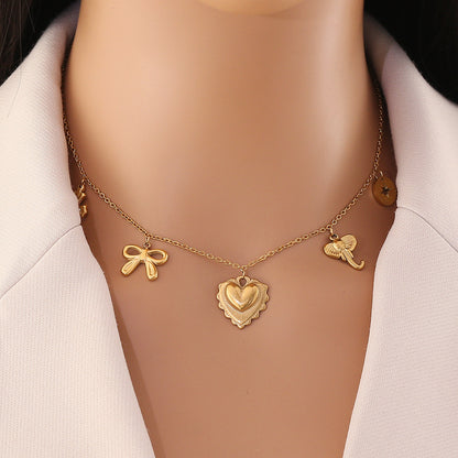 Heart, Bow & Cross Elephant Pendant Necklace