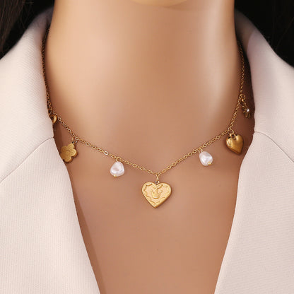 Heart, Bow & Cross Elephant Pendant Necklace