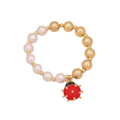 Faux Pearl Beaded Bracelet with Gold Beetle Charm