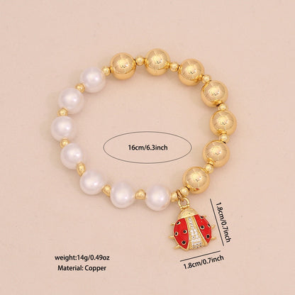 Faux Pearl Beaded Bracelet with Gold Beetle Charm