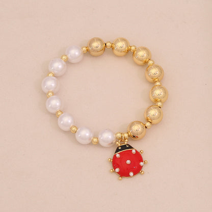 Faux Pearl Beaded Bracelet with Gold Beetle Charm