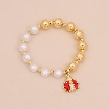 Faux Pearl Beaded Bracelet with Gold Beetle Charm