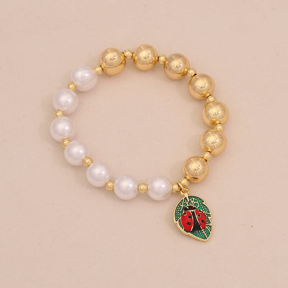 Faux Pearl Beaded Bracelet with Gold Beetle Charm