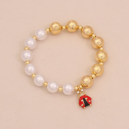 Faux Pearl Beaded Bracelet with Gold Beetle Charm