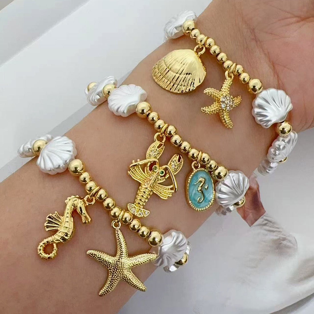 Faux Pearl Beaded Bracelet with Starfish & Sea Turtle Charms