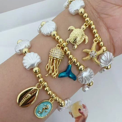 Faux Pearl Beaded Bracelet with Starfish & Sea Turtle Charms