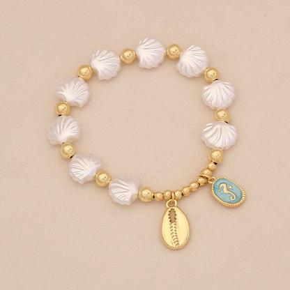 Faux Pearl Beaded Bracelet with Starfish & Sea Turtle Charms