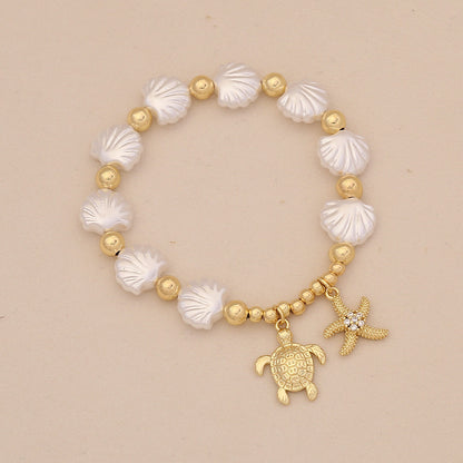 Faux Pearl Beaded Bracelet with Starfish & Sea Turtle Charms