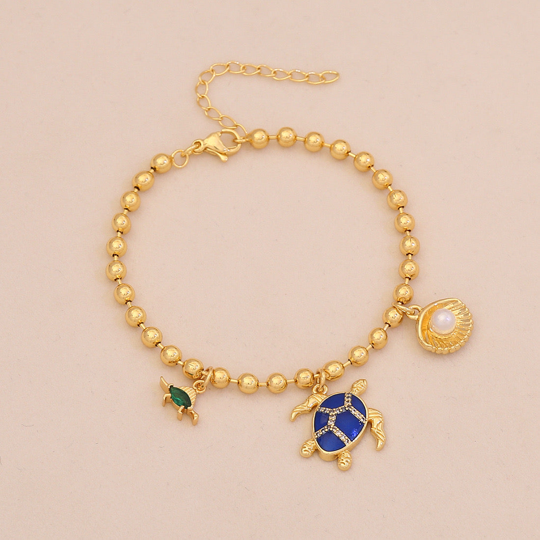 Golden Tide Ocean Charm Bracelet