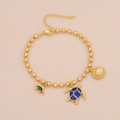 Golden Tide Ocean Charm Bracelet