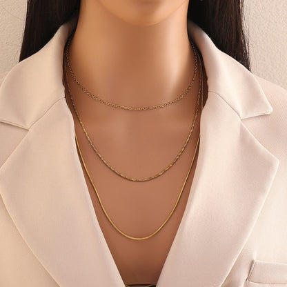 Golden Layers Triple Chain Necklace