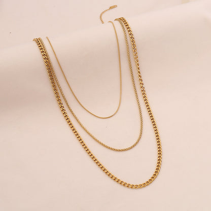 Golden Layers Triple Chain Necklace