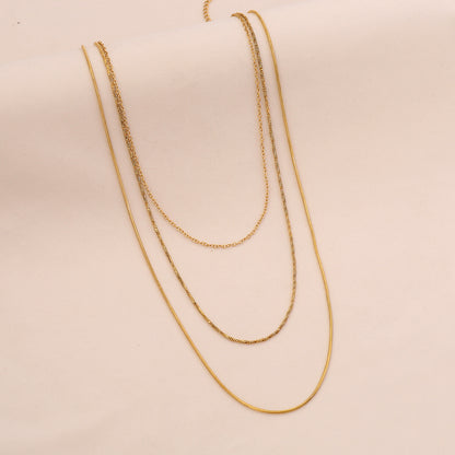 Golden Layers Triple Chain Necklace