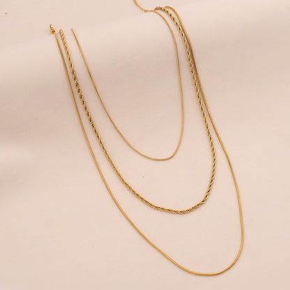 Golden Layers Triple Chain Necklace